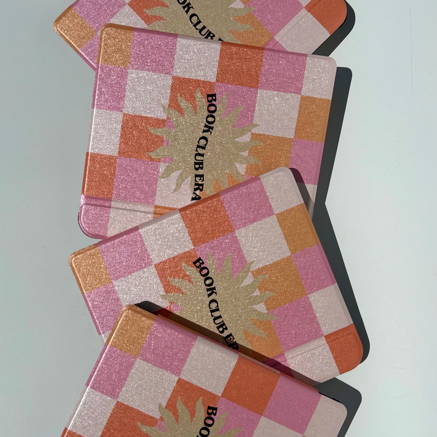 pink checkered kobo libra case with hand strap for comfort
