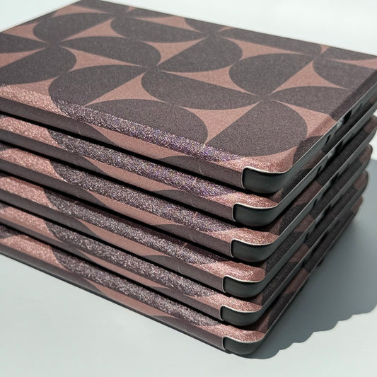 Case Society Choc Chip Kindle Case - stack of cases from side and base angle