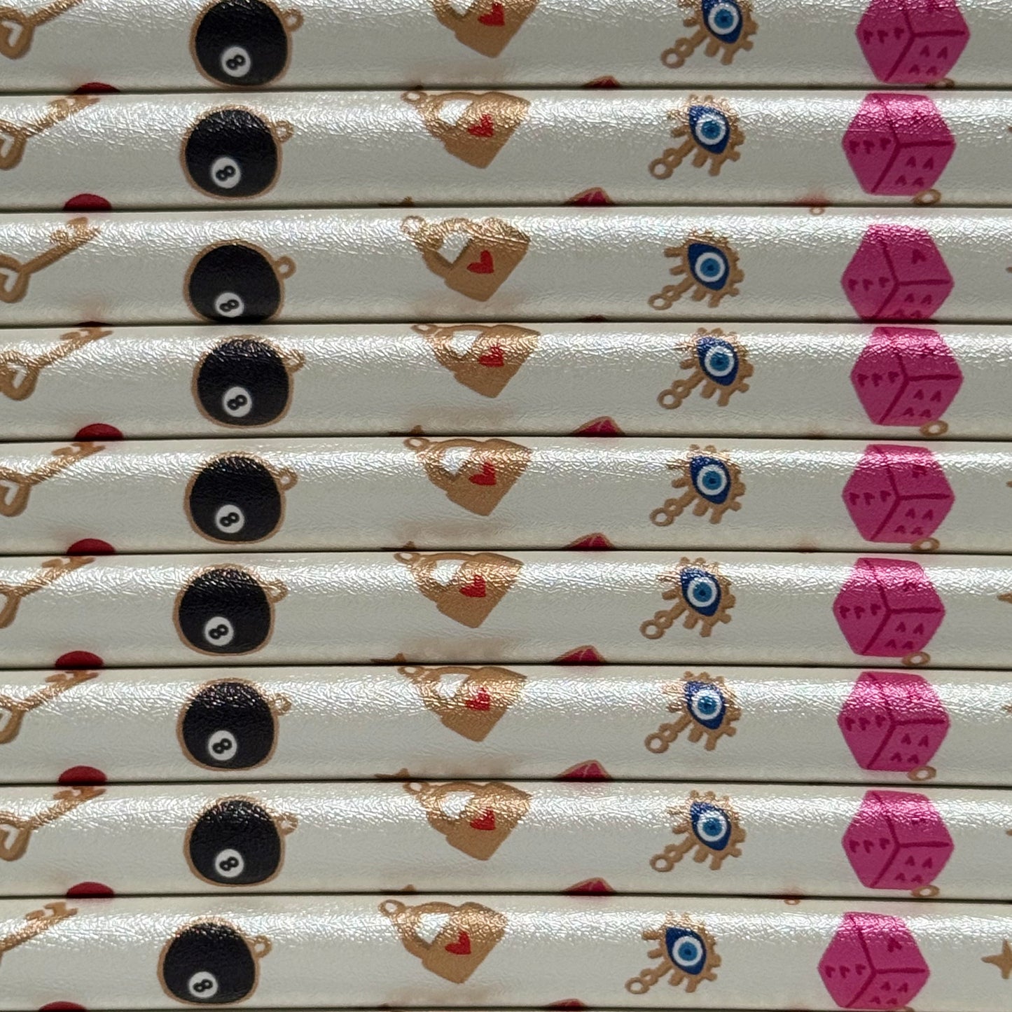 stack of white and pink kindle cases