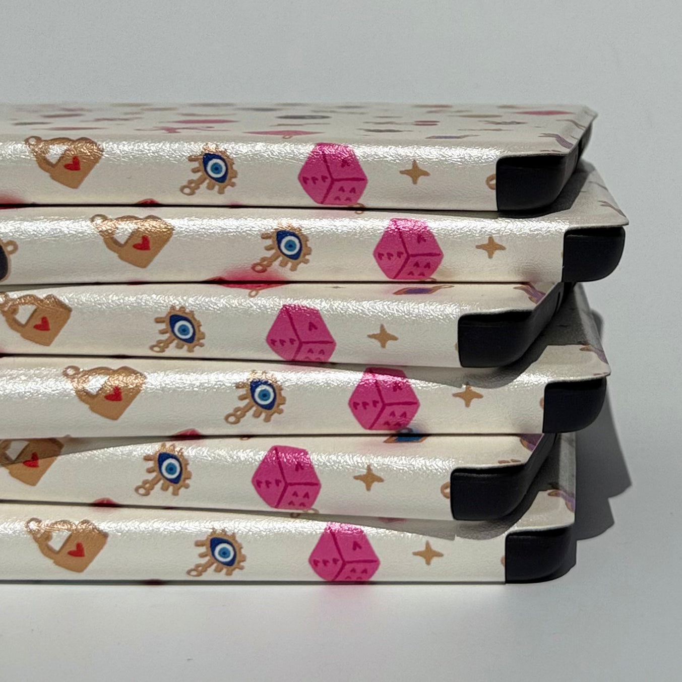 pink kindle cases stacked