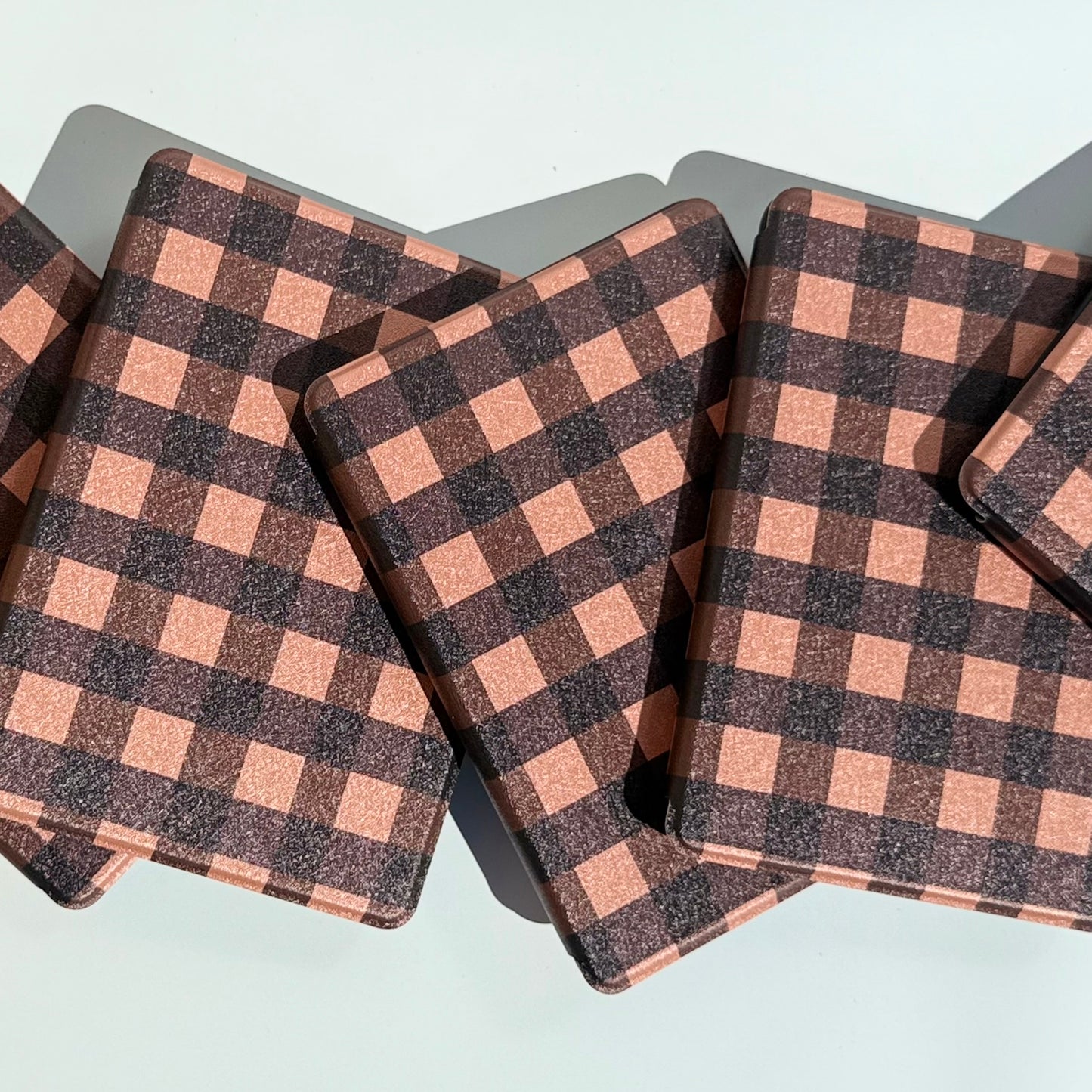 brown and tan kindle case layed out