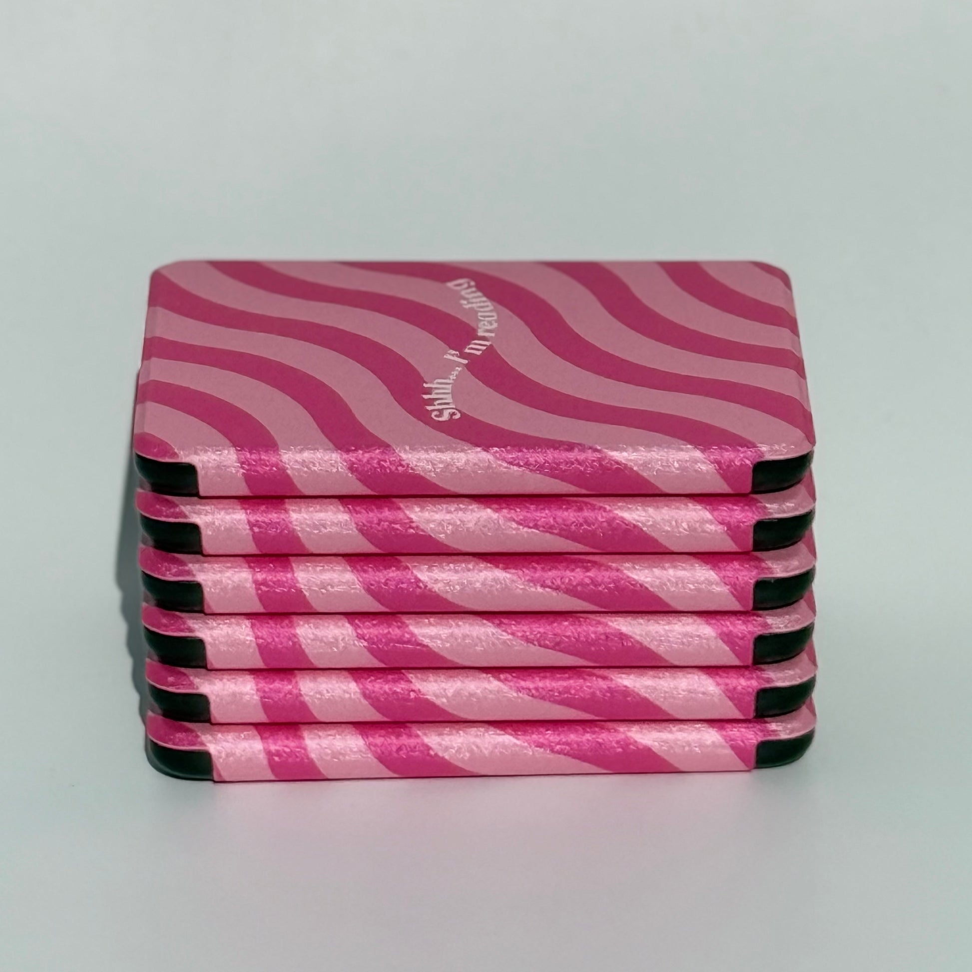 Magnetic close kindle covers in pink pattern with durable shell