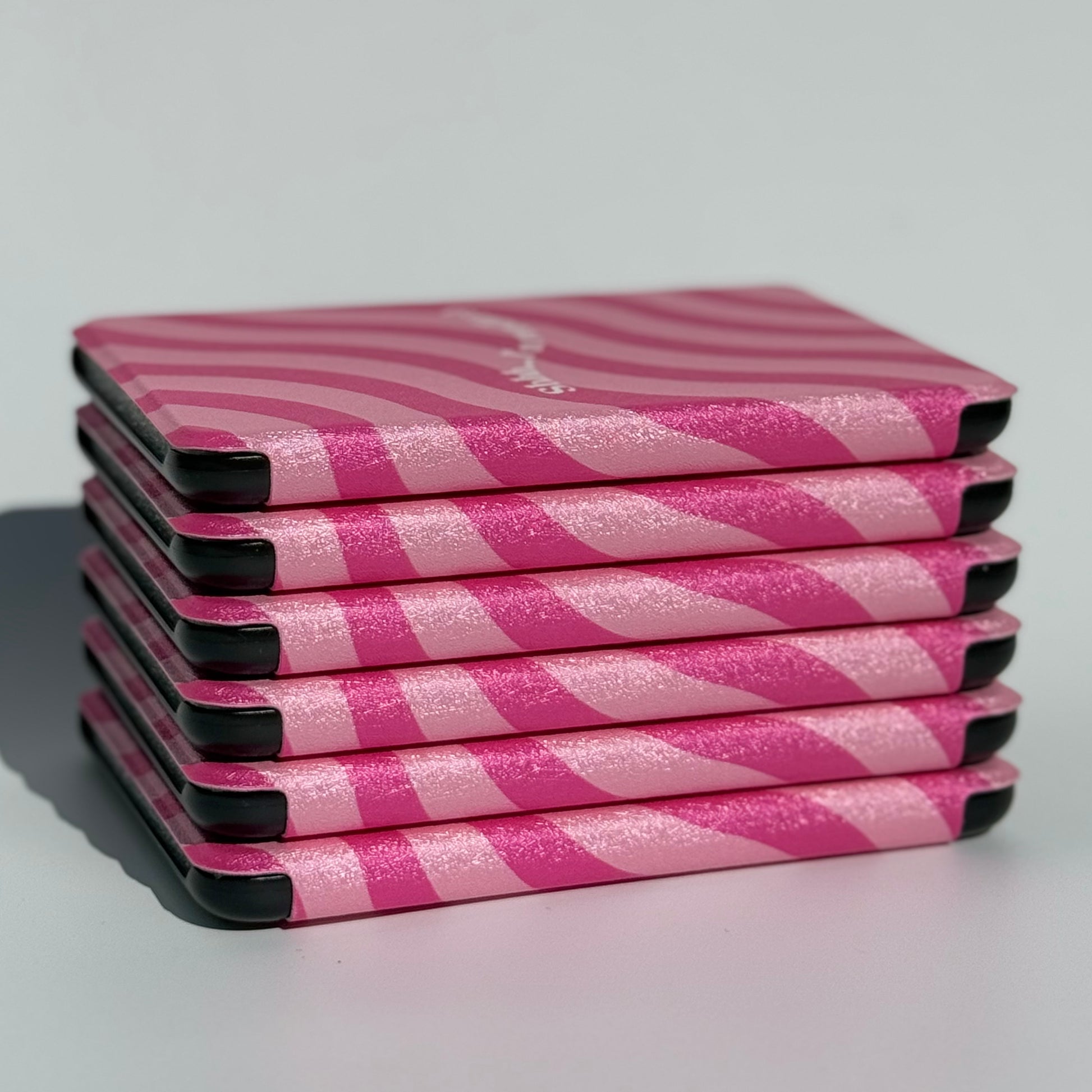Soft-touch pink Kindle cover with auto wake/sleep function