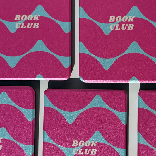 blue and pink book club text on kindle case