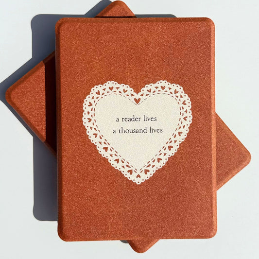 Tan brown Kindle case with a lace heart reading a reader lives a thousand lives, Australia
