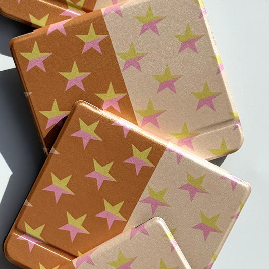 Pink and gold star pattern Kobo case.