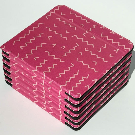 Front view of Literary Lines Kobo Libra case showing hot pink cover with white zigzag and squiggle line design