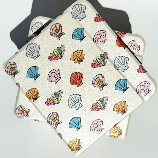 Shores of ophelia kobo libra case with handstrap and shell pattern