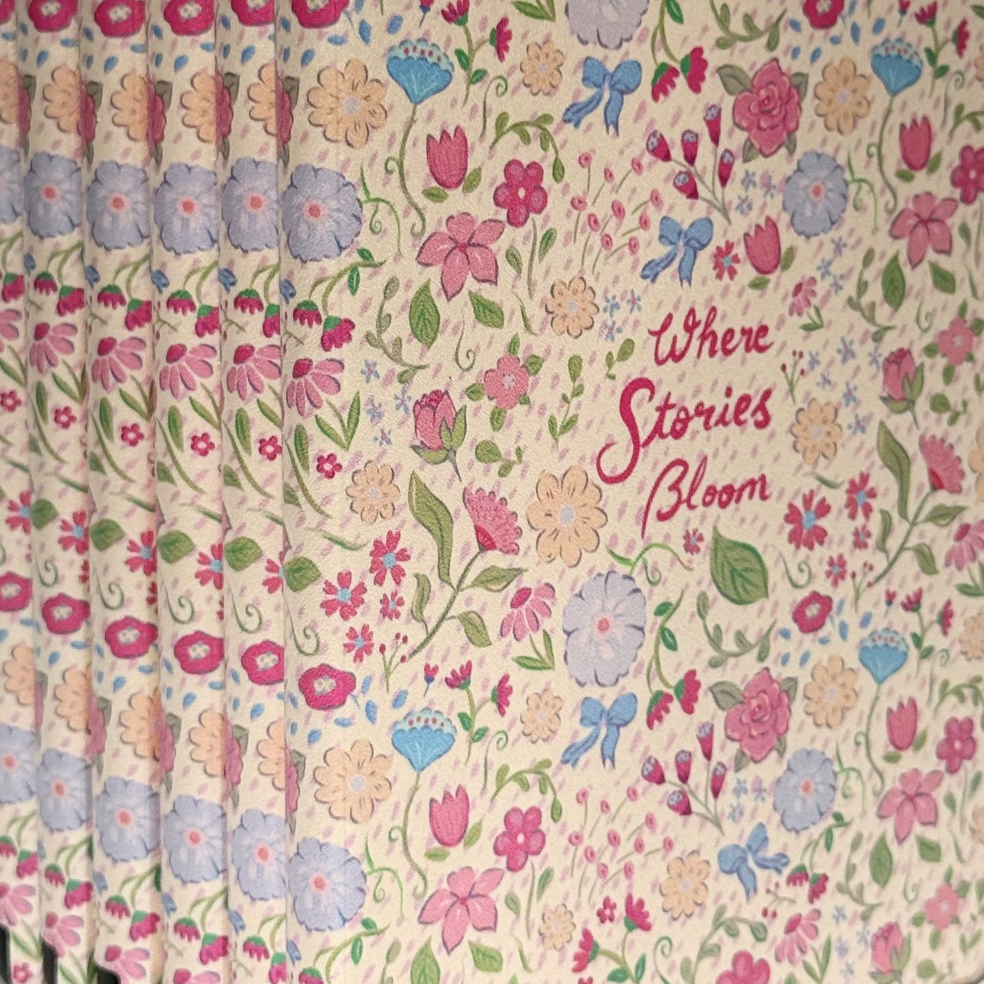 Bookish Kindle case Australia with cottagecore floral illustration, blue bows and hand-painted flowers