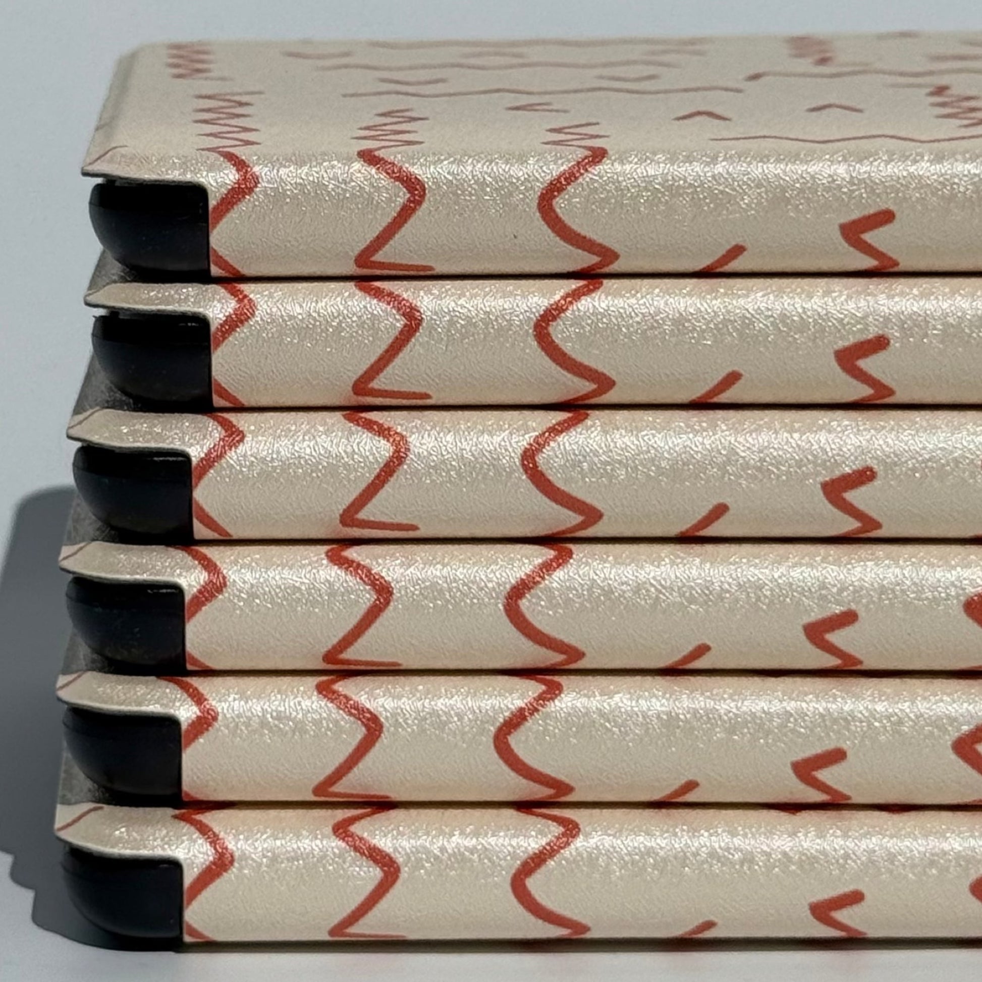 Between The Lines oatmeal squiggle Kindle case with soft interior