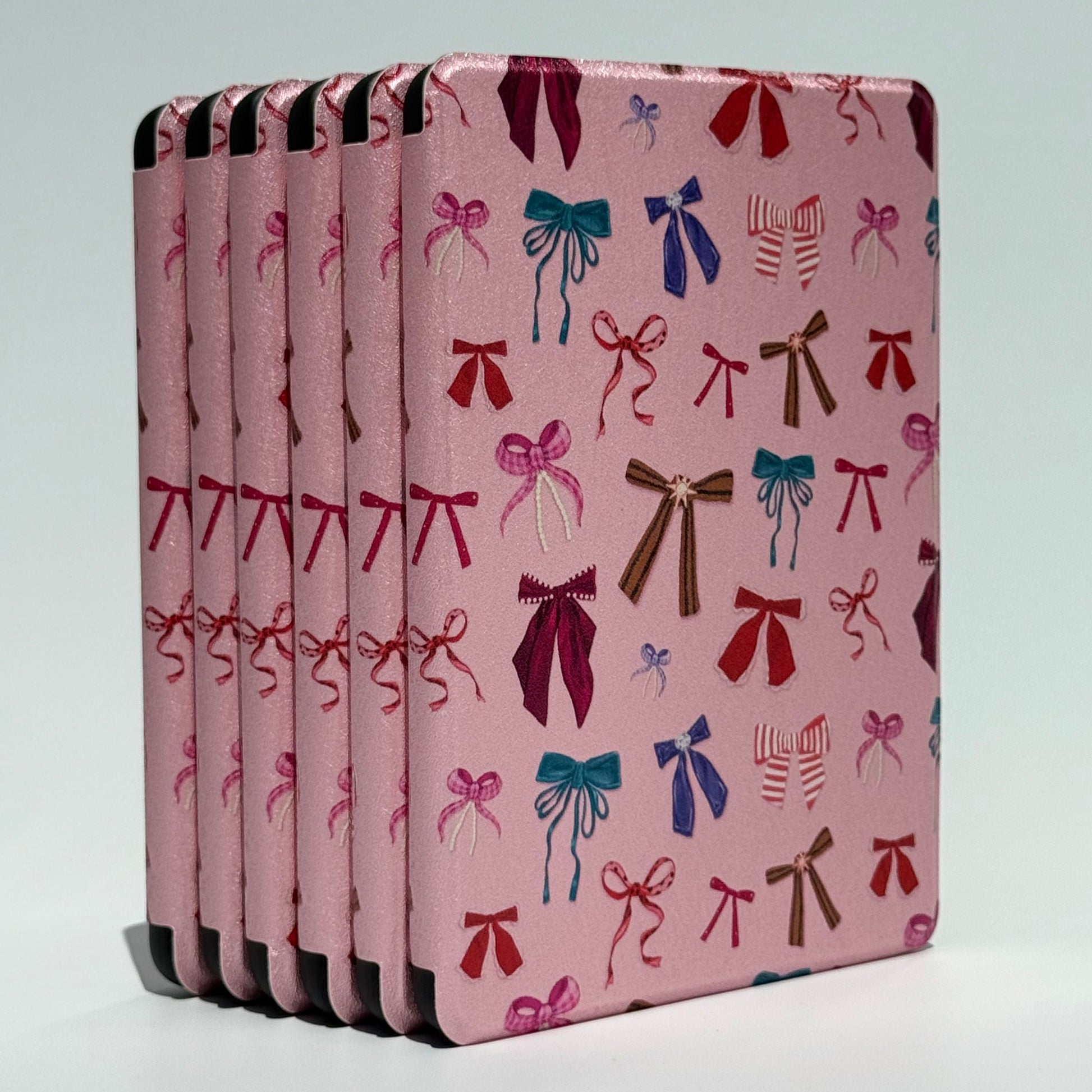 Pink patterned Kindle case with bow pattern