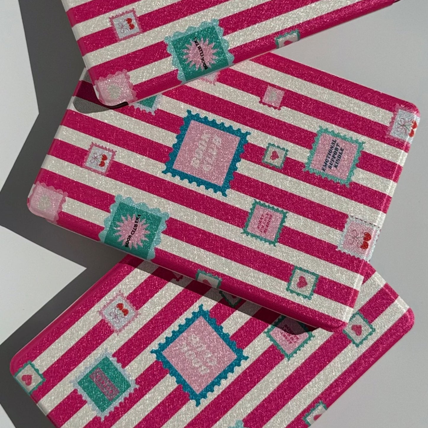 Booking Hearts Kindle case, pink and white stripe with postage-stamp love letters, aesthetic pink Kindle cover
