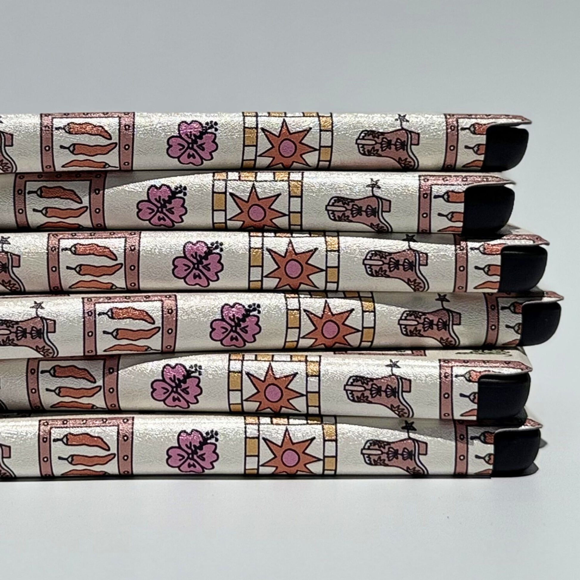 Stylish western Kindle case with cactus boot and horseshoe icons