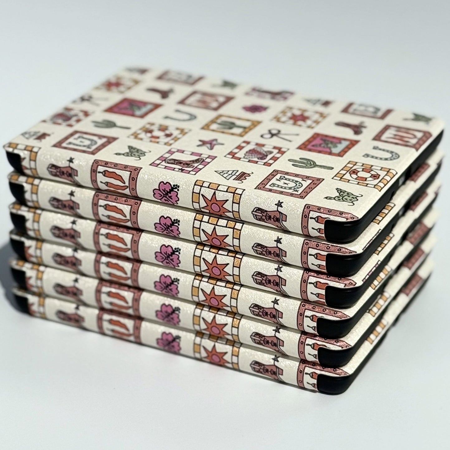 Cowgirl themed Kindle case with pastel western symbols