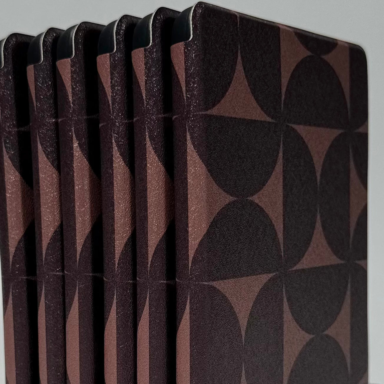 Case Society Choc Chip Kindle Cases - close up of stack of standing cases