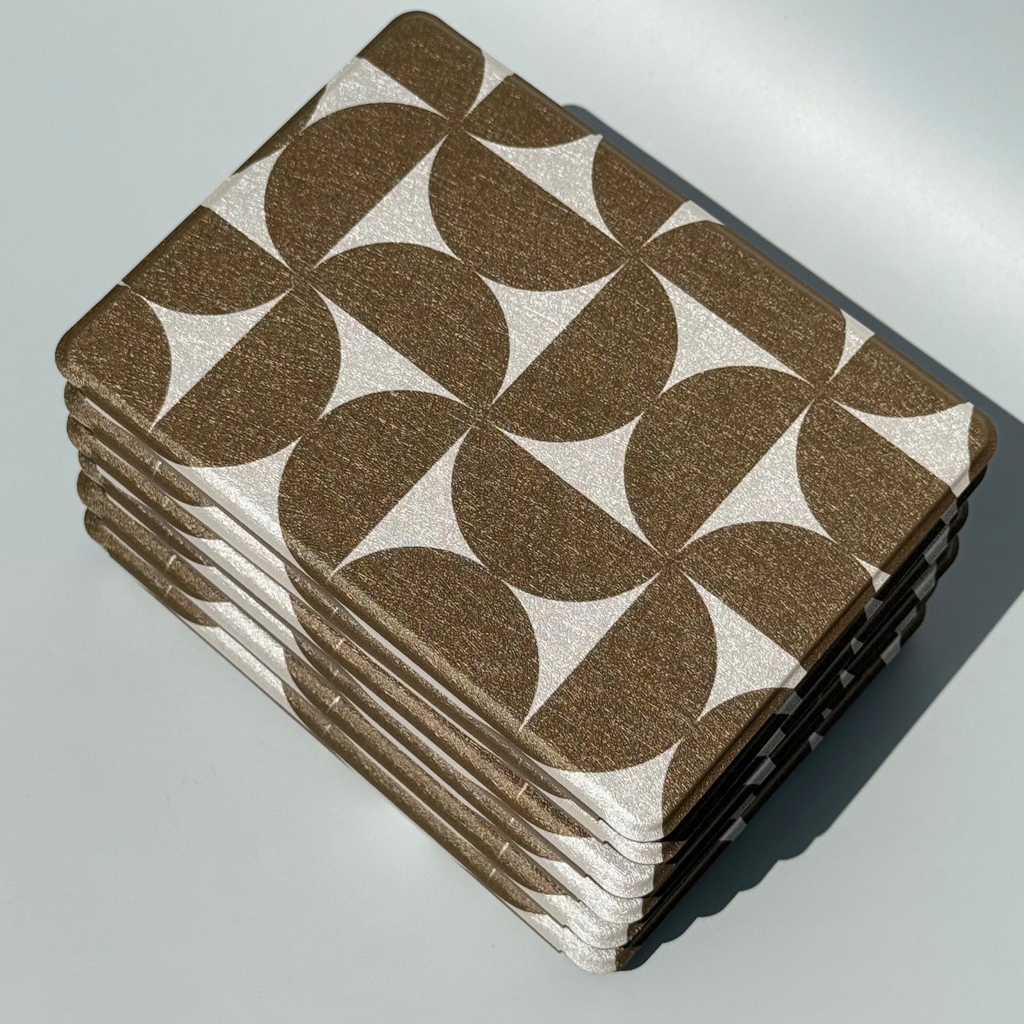 Olive Chip olive geometric Kindle cases stacked from above