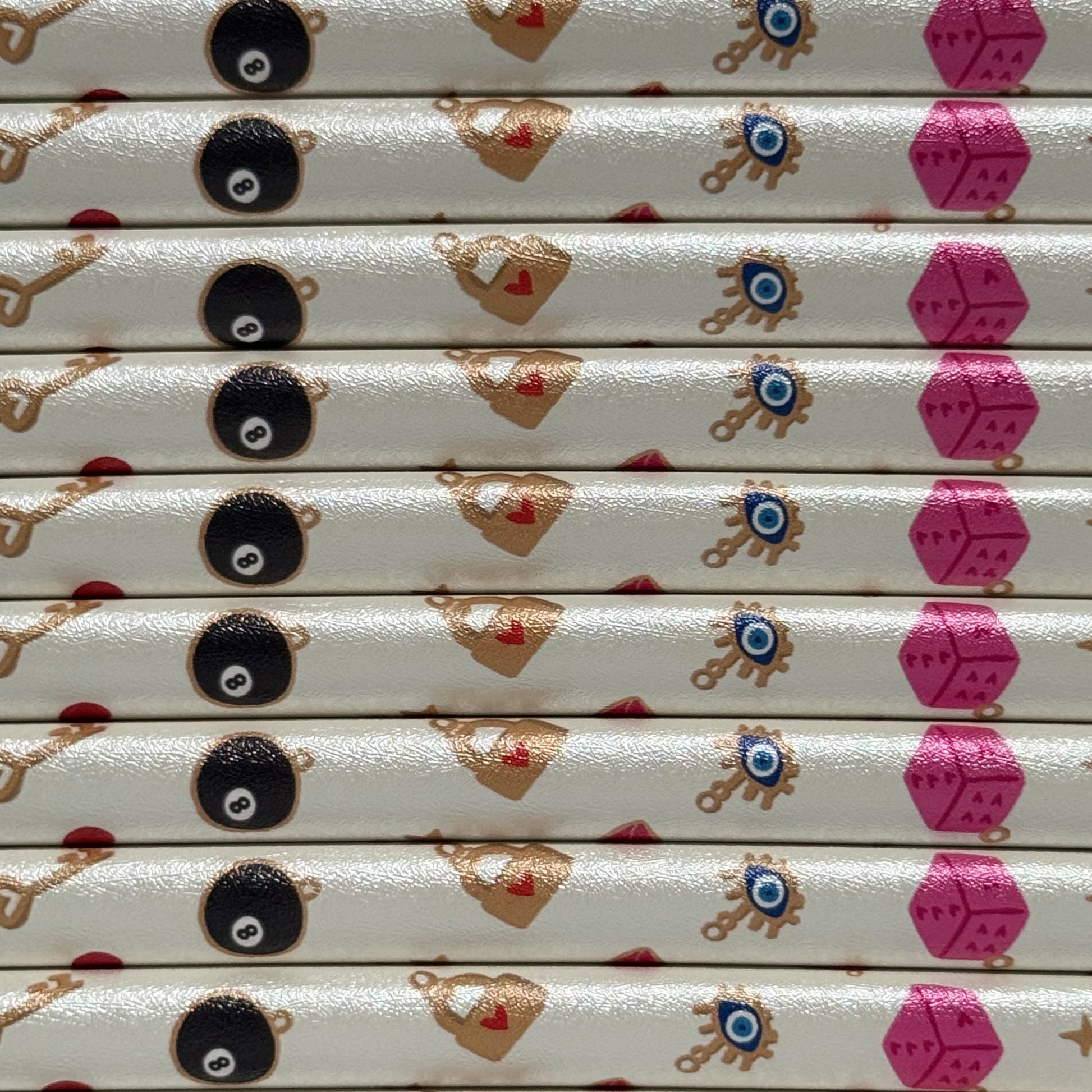 stack of white and pink kindle cases