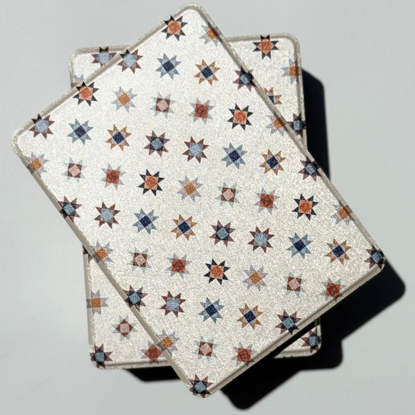 Everloom cream quilt-star Kindle case, front view