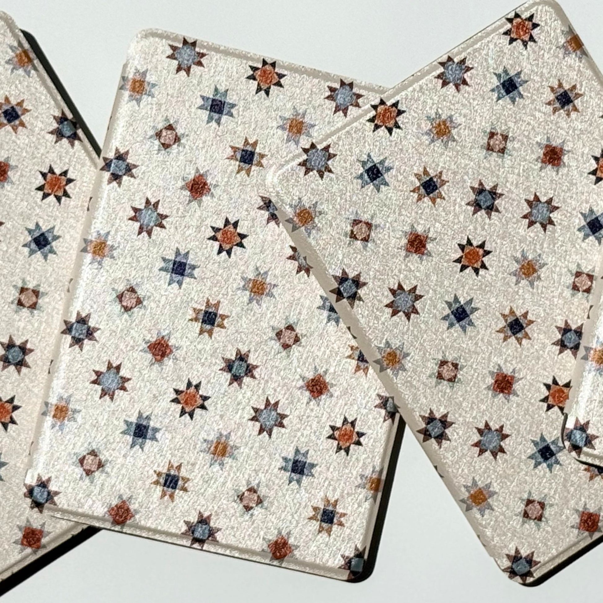 Group of Everloom folk quilt-star Kindle cases