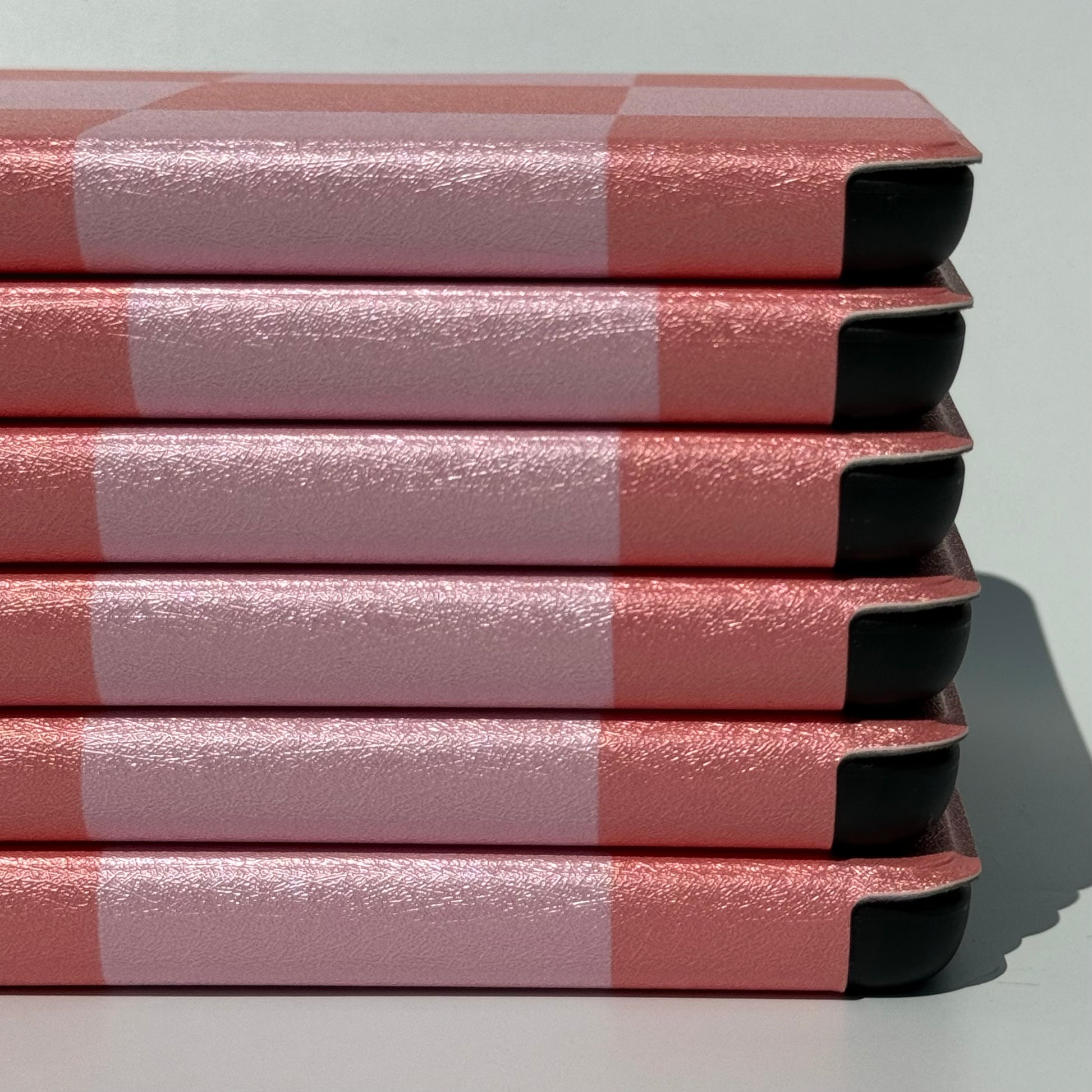 Fairy Tales Kindle Case - up close view of spines of stack of cases