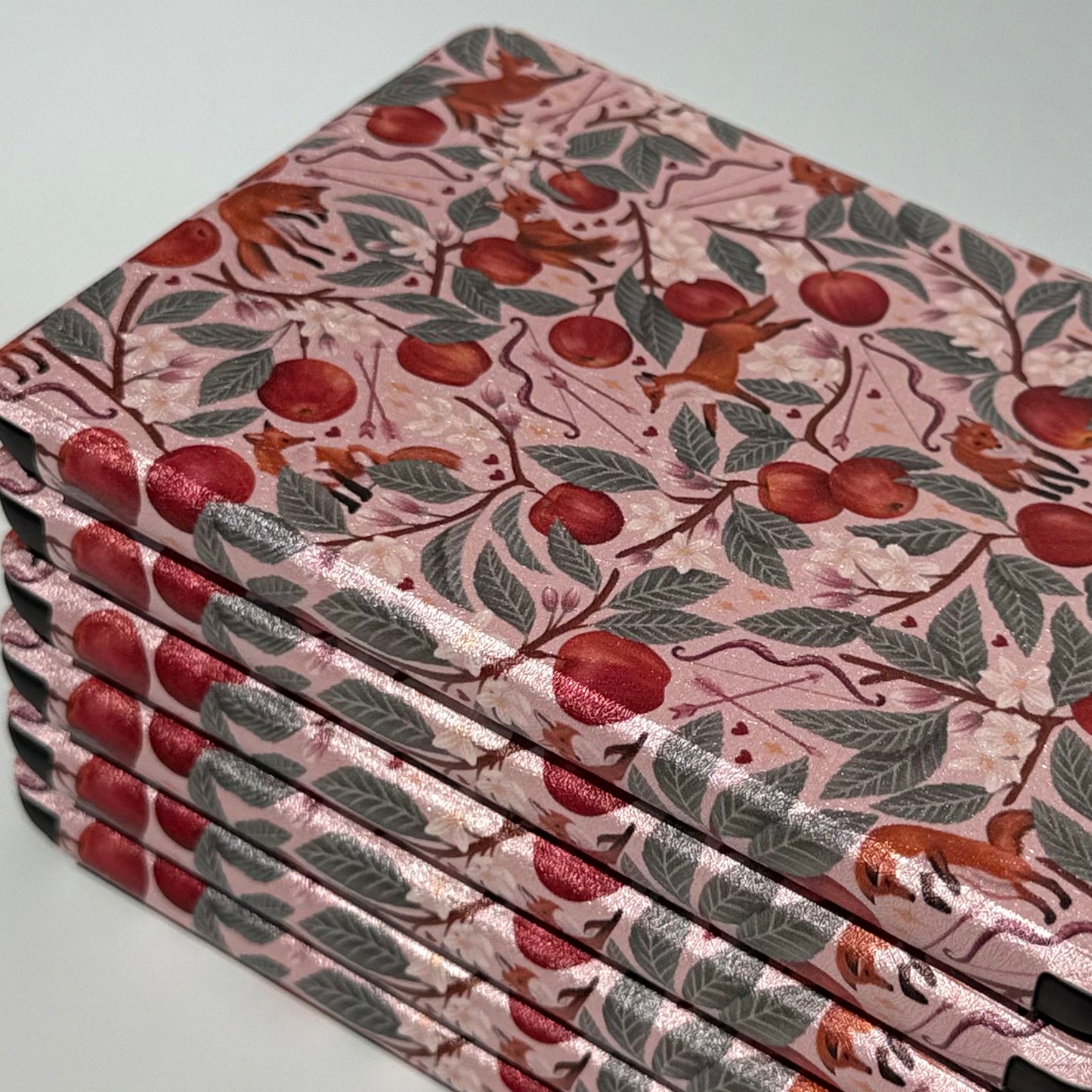 stack of kindle cases with bookish print