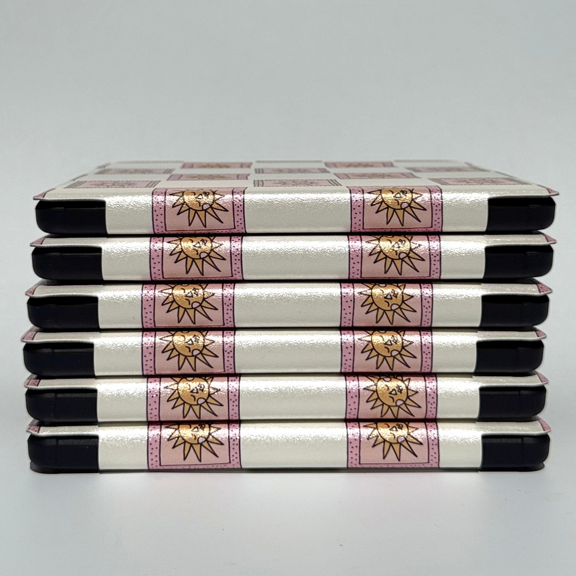 Pink and white Kobo Libra Case with sun pattern