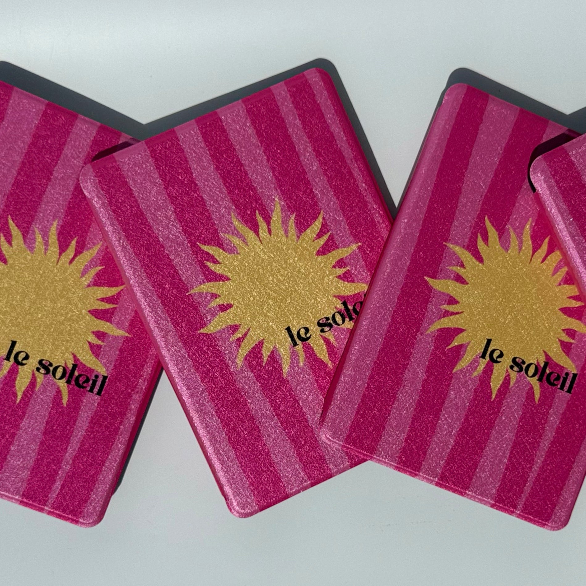 Le Soleil Kindle Case - front view of overlapping cases