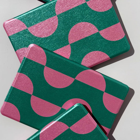 Pink Crescent Kindle case, pink crescent arches on deep green, bold retro geometric Kindle cover