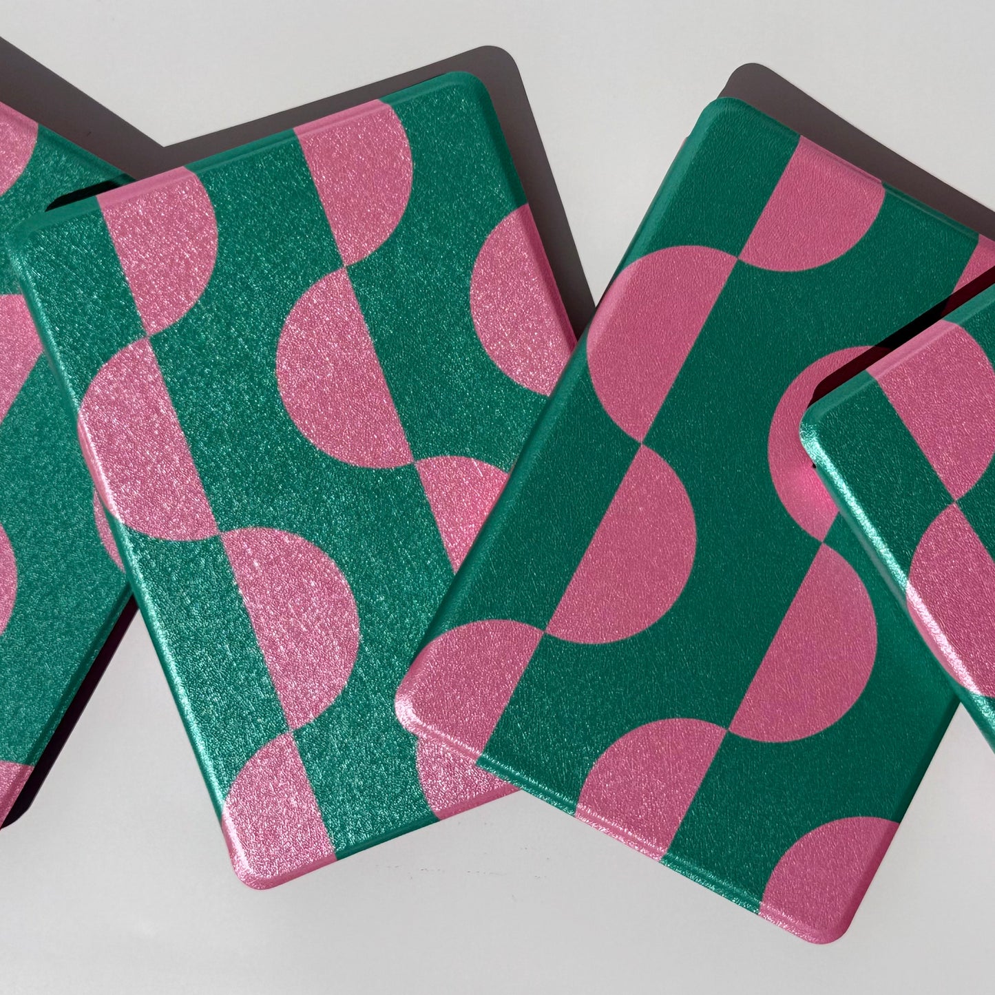 Top view of Pink and green Case Society crescent kindle cases for paperwhite