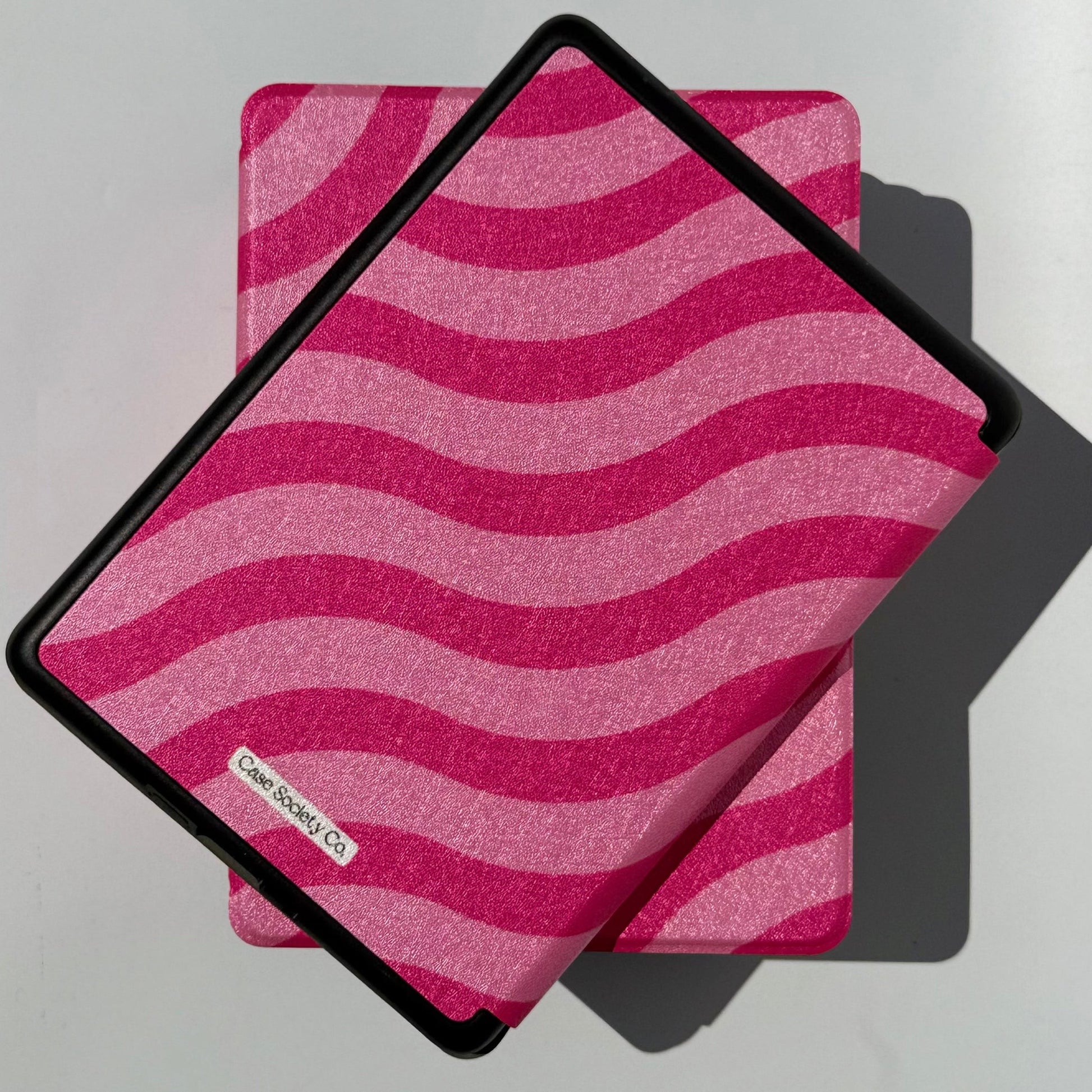Back of the Shhh I'm Reading Kindle case showing the hand strap