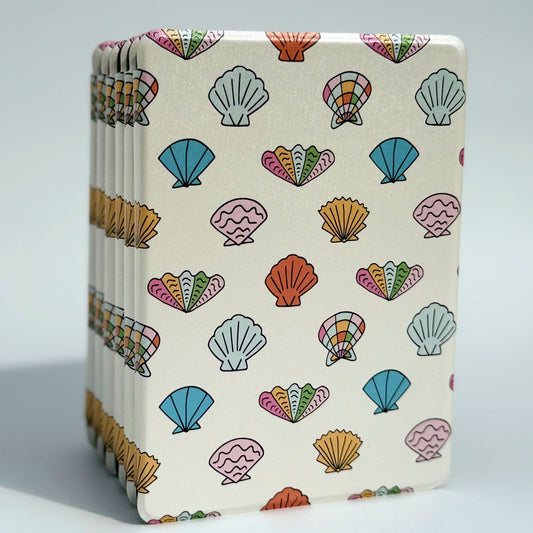 Shores of Ophelia Kindle case with pastel seashell pattern design