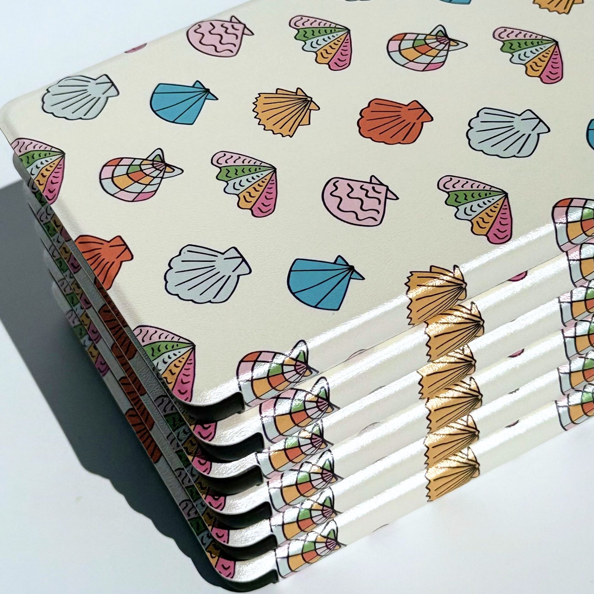 Side view of the Shores Of Ophelia seashell Kindle case