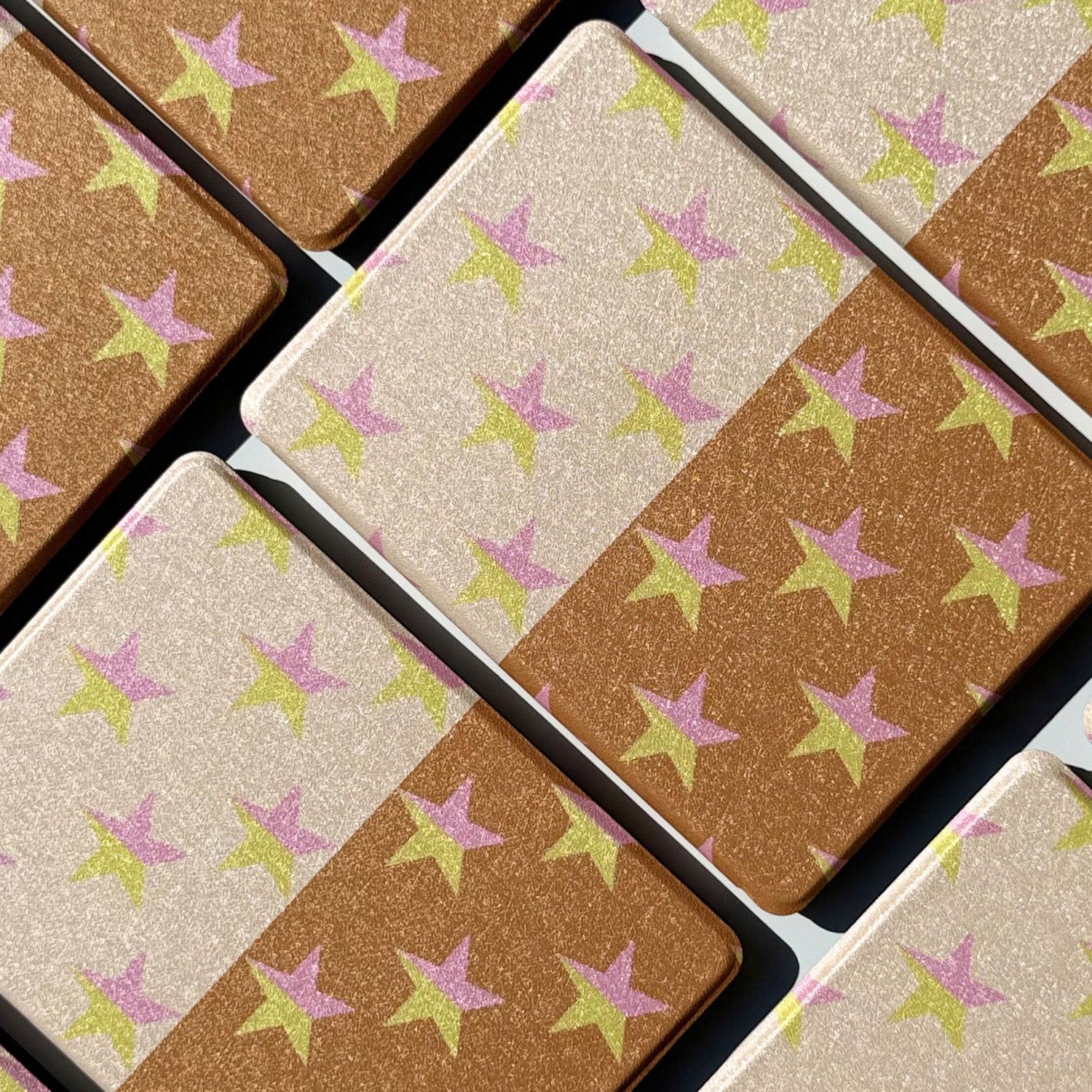 Stylish Star Dream Kindle case with soft pastel print and hand strap