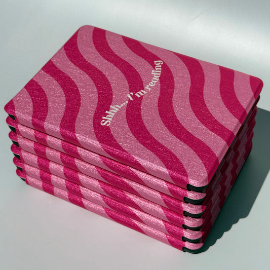 Shh Im Reading Kindle Case - front top view of stack of cases