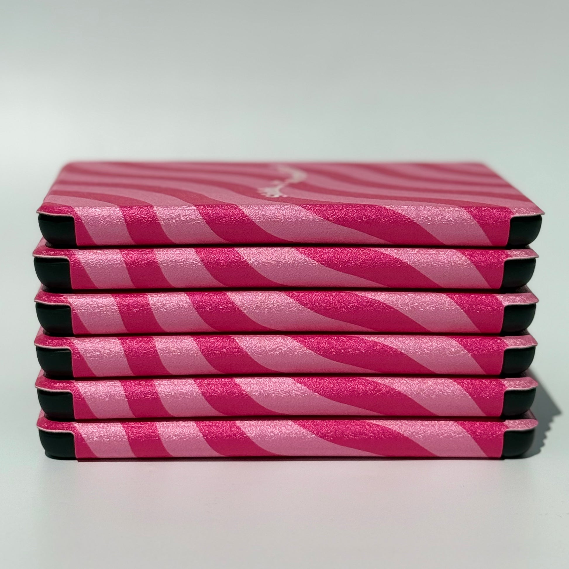 Magnetic close kindle covers in pink pattern with durable shell