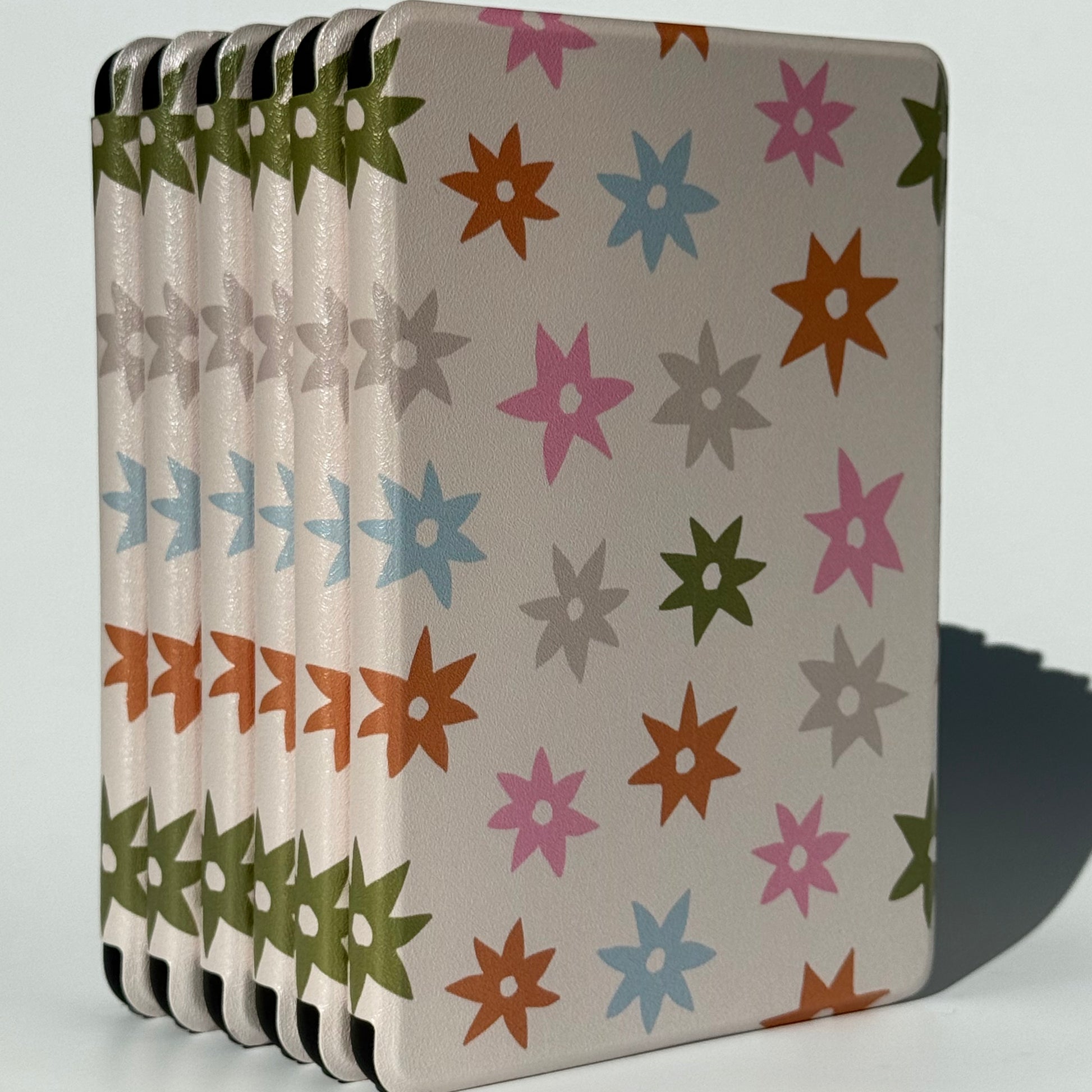 Kindle cases standing up on white background 