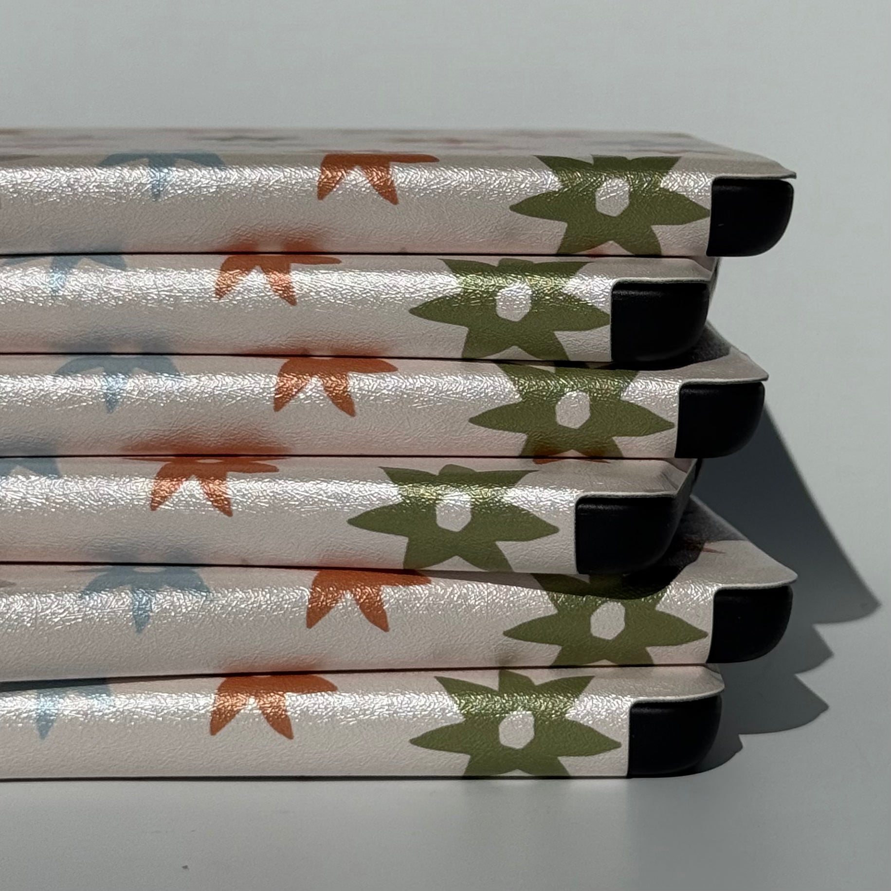 Aesthetic kindle cases with star pattern stacked 