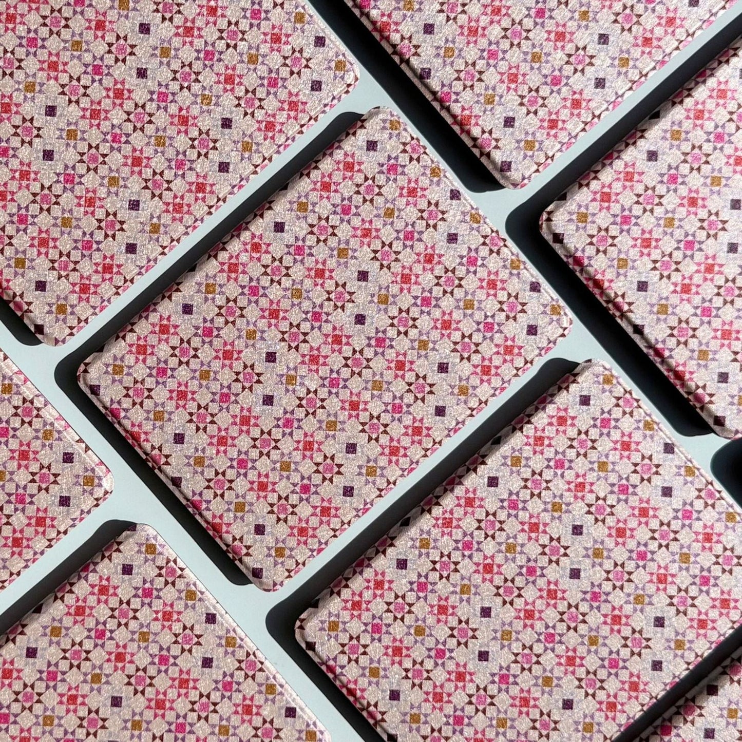 Group of Storywoven woven floral Kindle cases