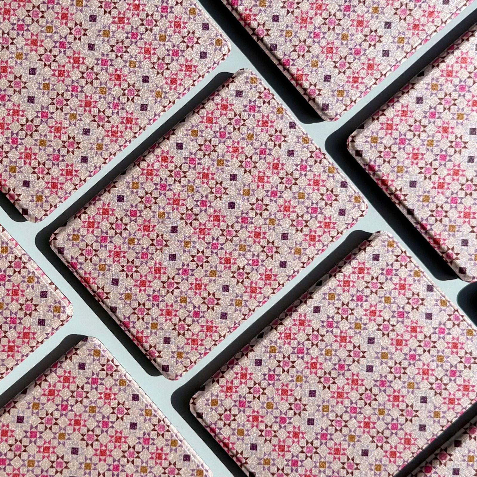 Group of Storywoven woven floral Kindle cases