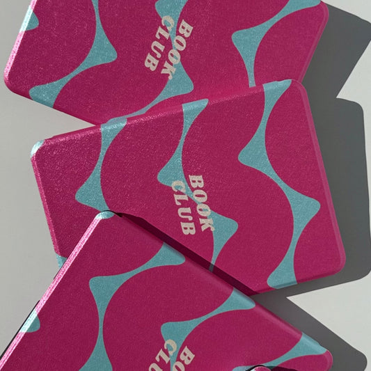 Tidal Crush Kindle case, magenta pink and teal wavy print with 'book club' lettering, bold pink Kindle cover