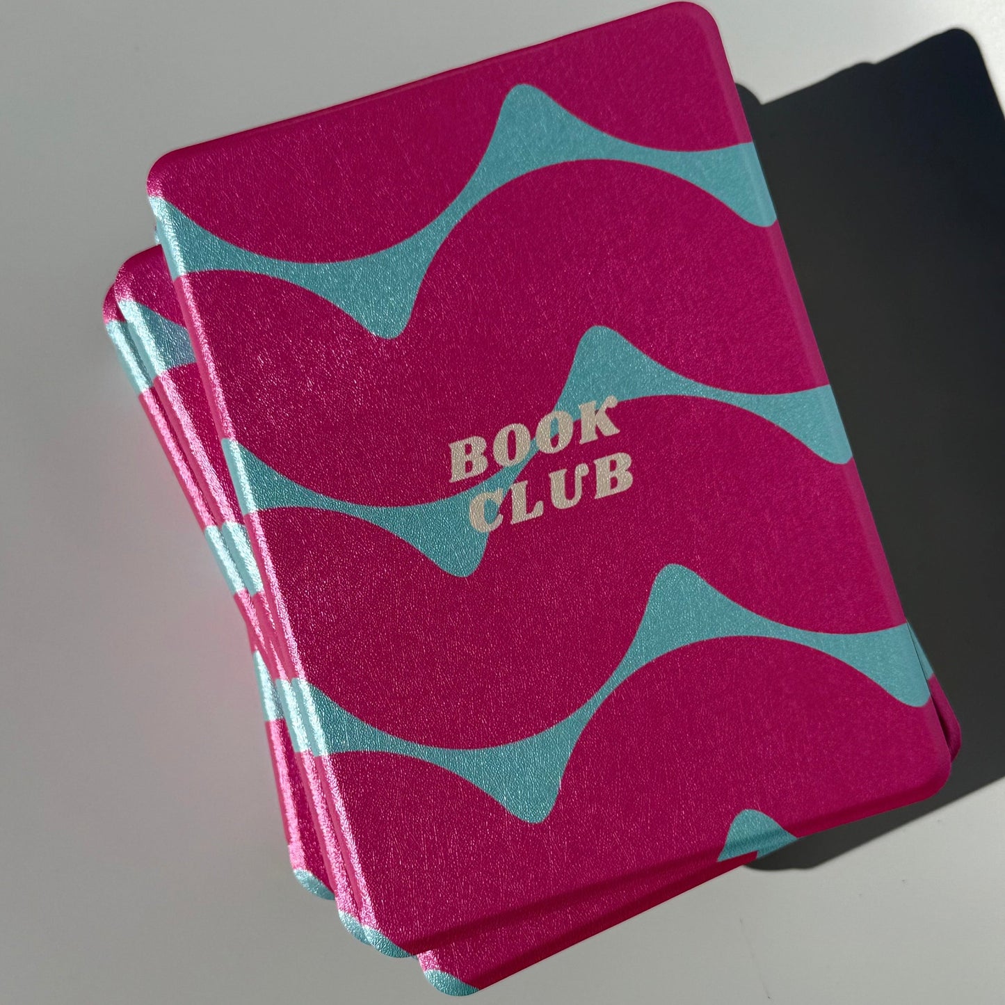 Tidal Crush pink and teal wavy Kindle case with hand strap