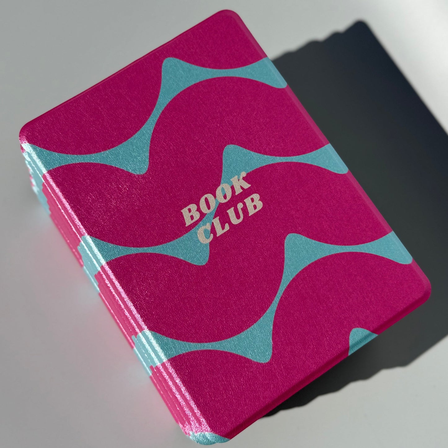Tidal Crush pink and teal book club Kindle cases stacked, Case Society Australia