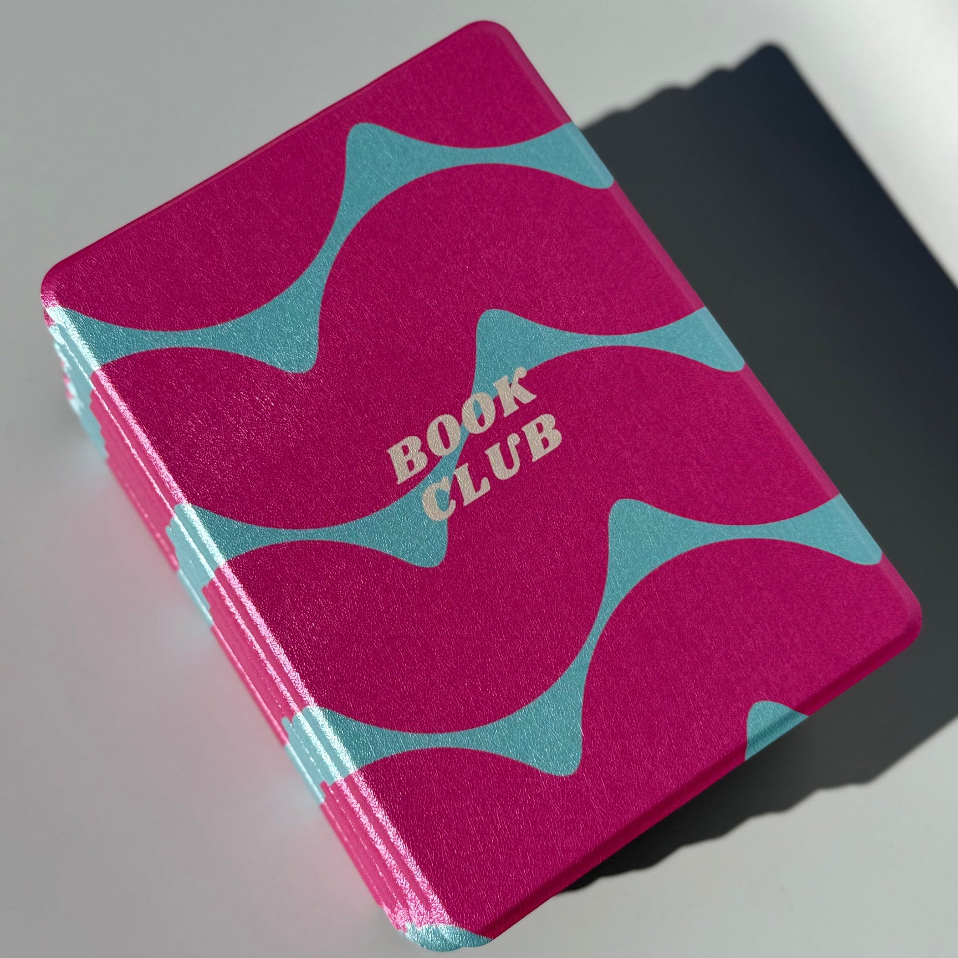 Tidal Crush pink and teal book club Kindle cases stacked, Case Society Australia