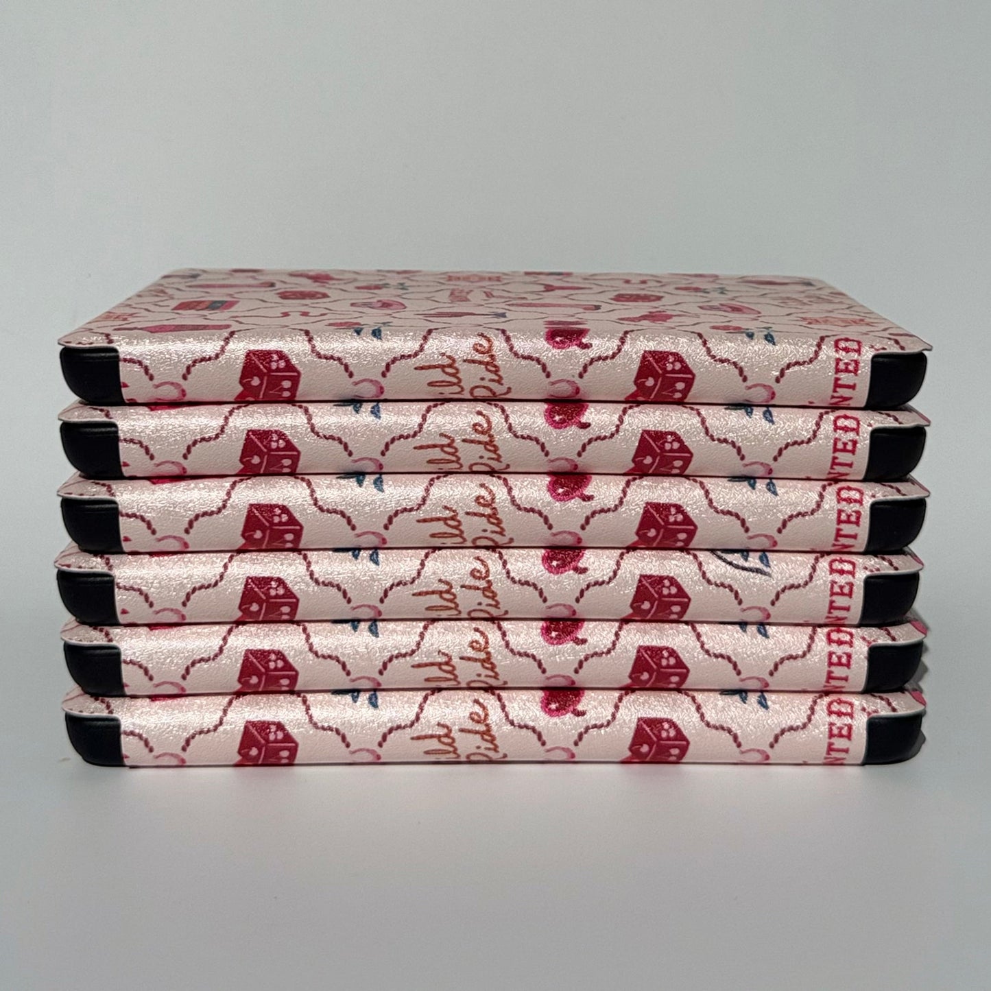 Wild Ride pink western Kindle case, flat lay showing the cowgirl print