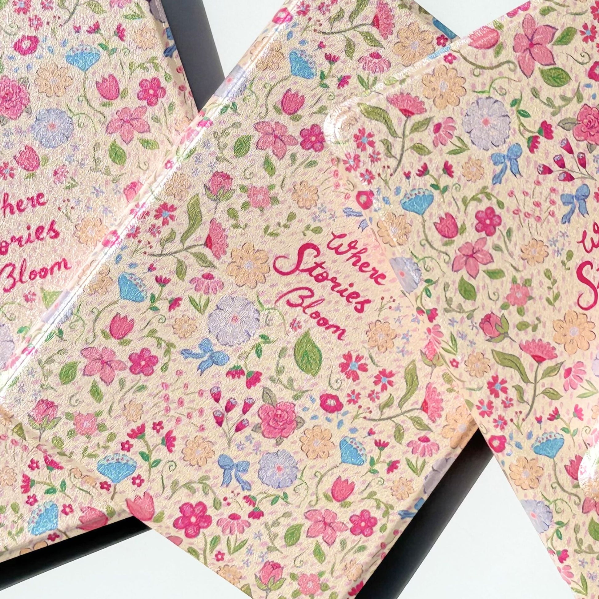 Floral Kindle case Australia featuring "Where Stories Bloom" hand-lettered design with pink and blue wildflowers