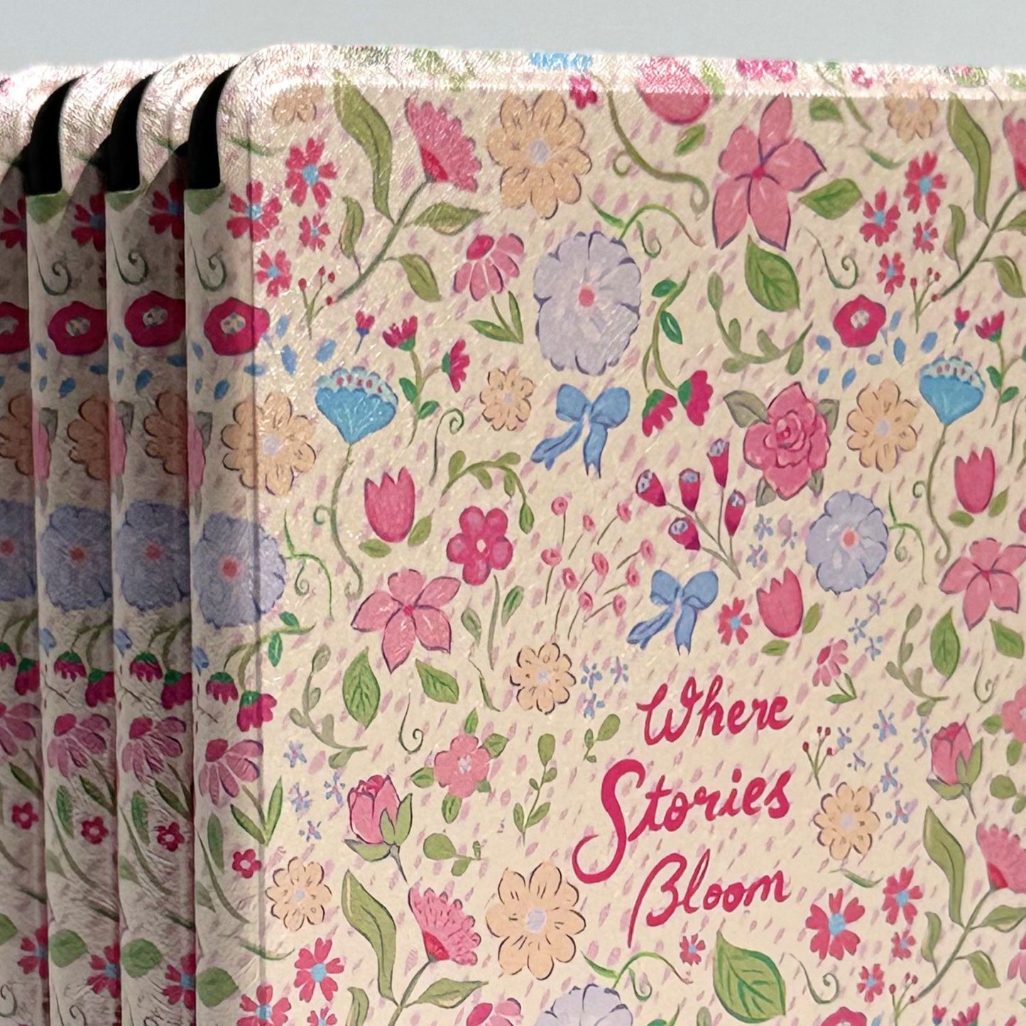 Aesthetic Kindle case Australia — Stories Bloom design with delicate pink, blue and peach florals