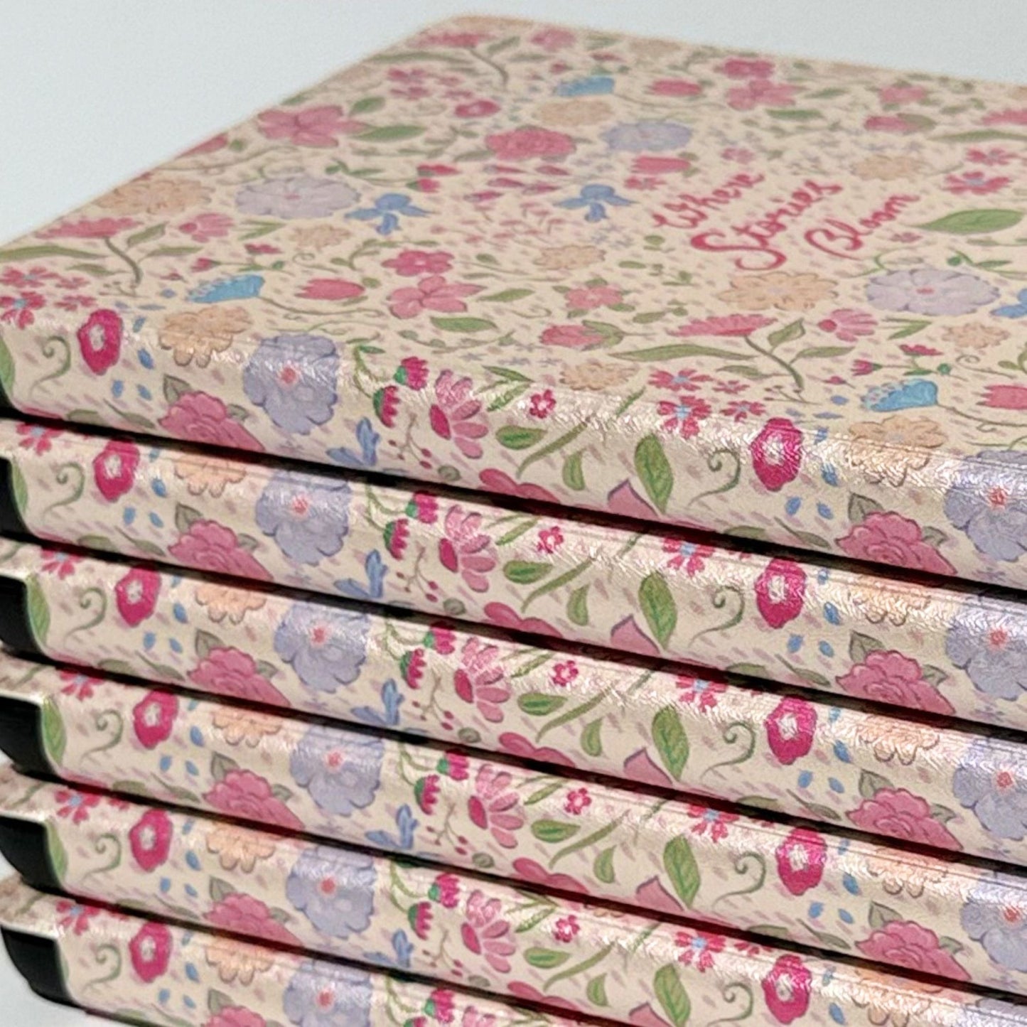 Romantasy Kindle cover featuring pastel wildflowers, pink roses and botanical illustrations on cream