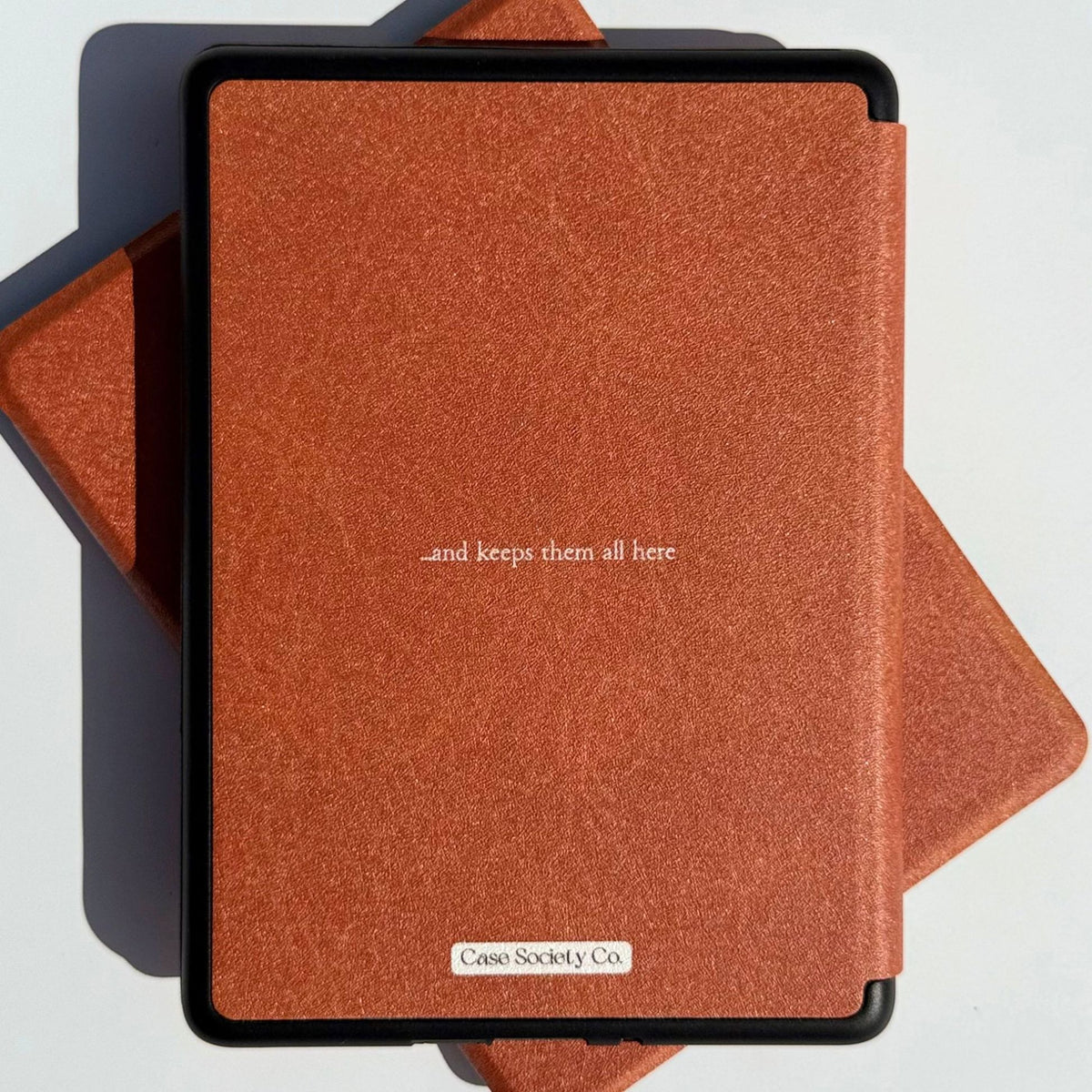 Back of the A Thousand Lives Kindle case reading and keeps them all here, Case Society Co