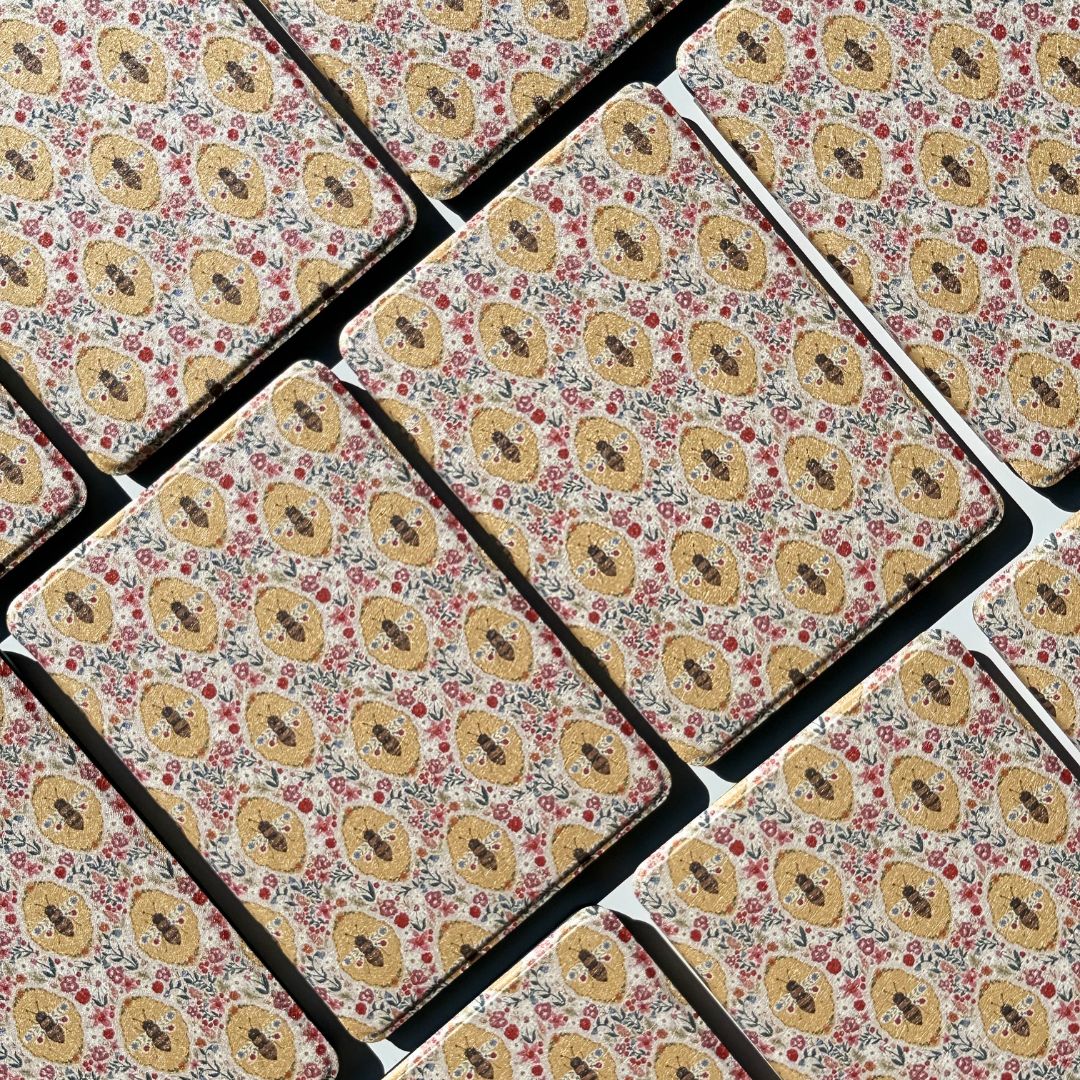 Aerial flatlays of Beekeeper's Garden Kindle cases in a grid — bookish vintage floral Kindle case Australia