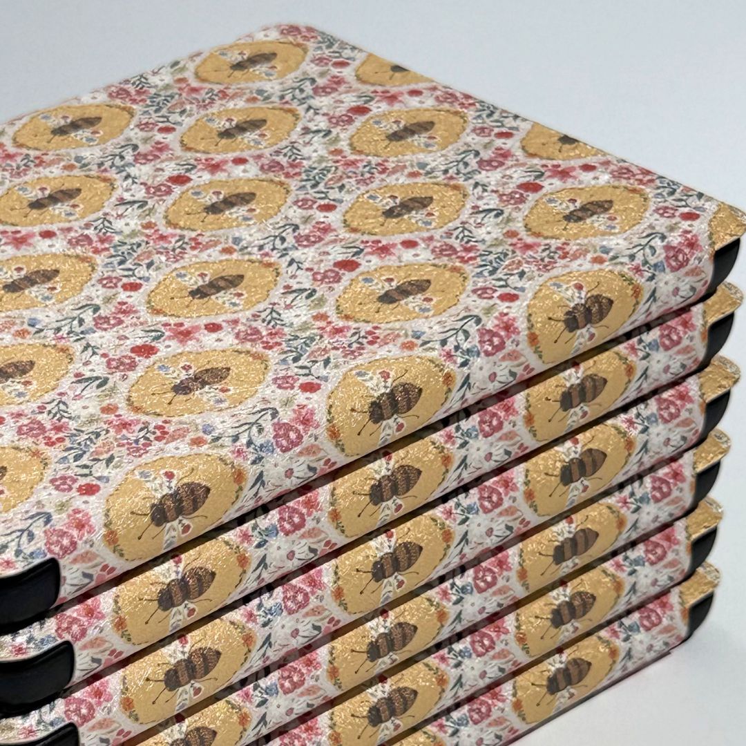 Beekeeper's Garden Kindle case standing upright showing the vintage floral bee tapestry — aesthetic cottagecore case AU